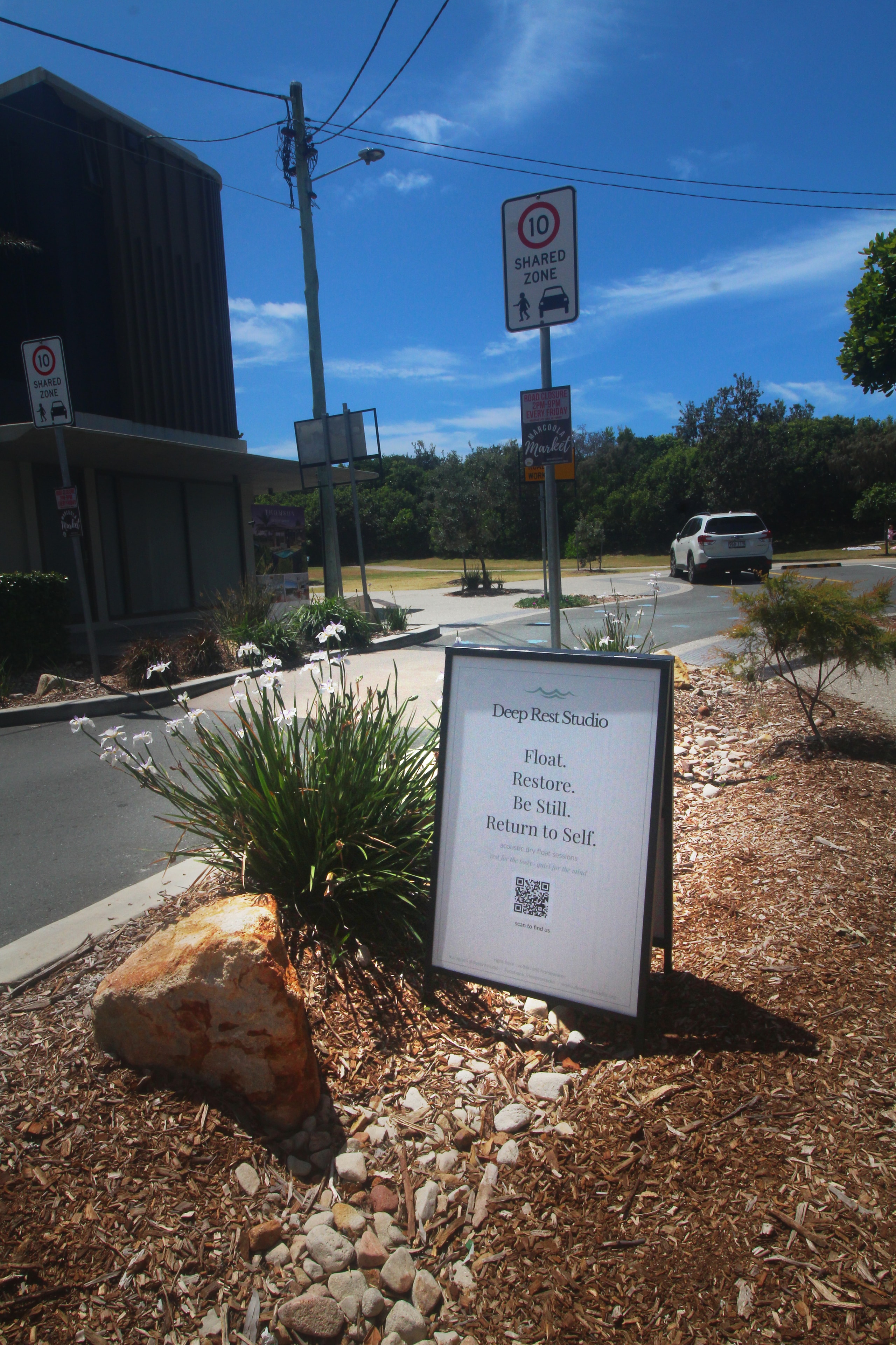 Deep Rest Studio entrance with signage and native garden, Sunshine Coast